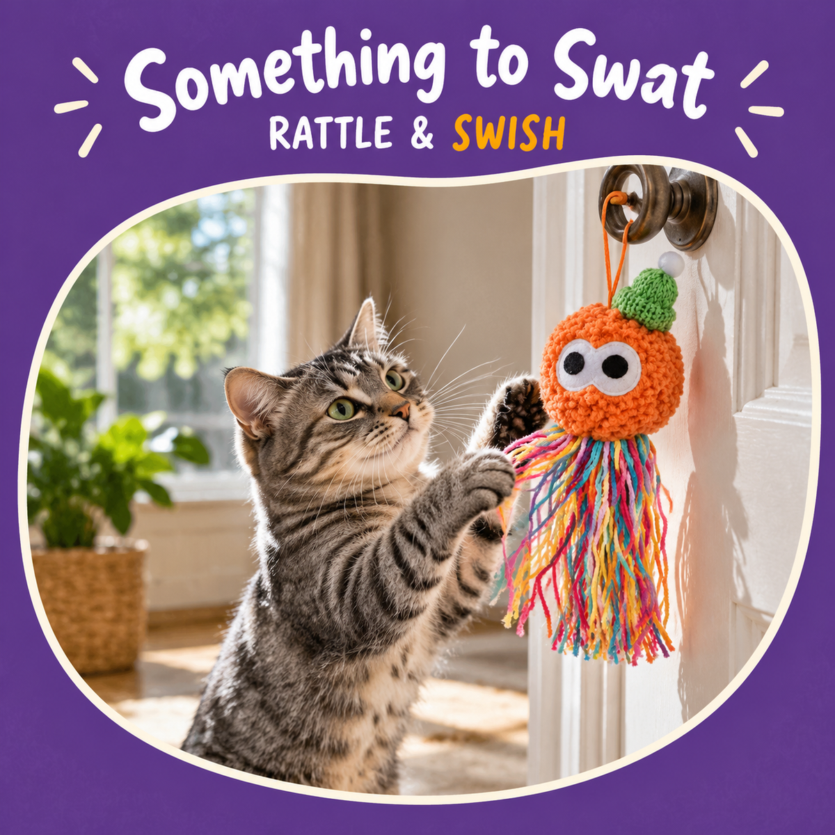 Cat playing with LitterBond Catnip Yarn Octopuses: Something to Swat