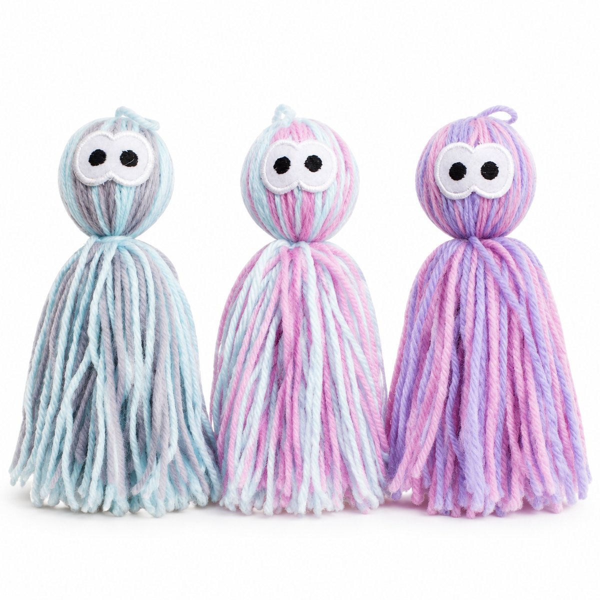 LitterBond Rattling Yarn Tassel Dolls, assorted 3-pack on a white background